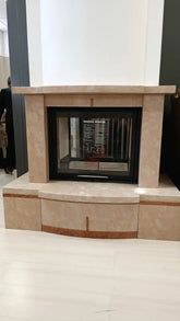 MCZ B70 termocamino bifacciale con airsystem e rivestimento Alisei Omero